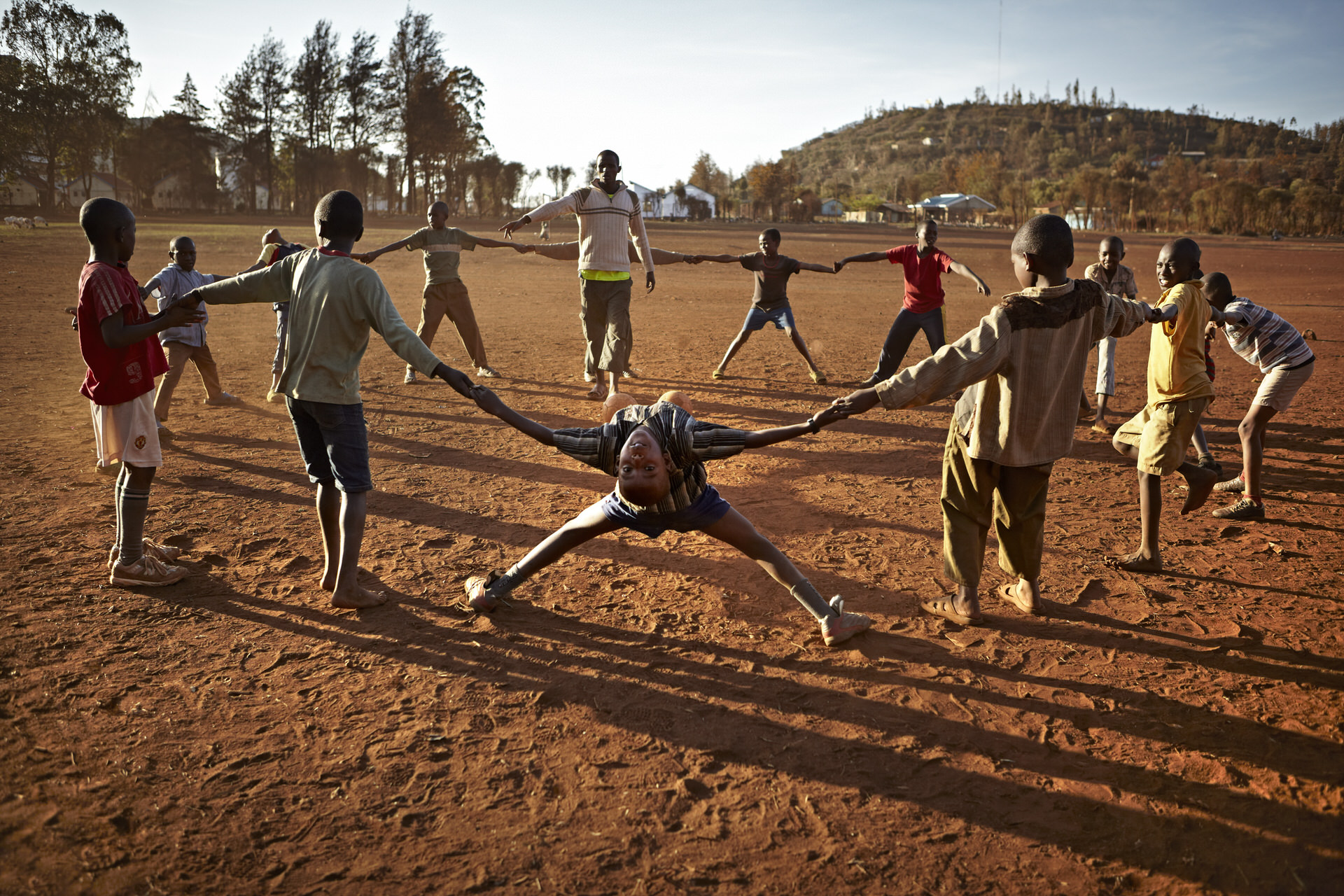 Global Peacebuilder Network - Children playing in a cricle